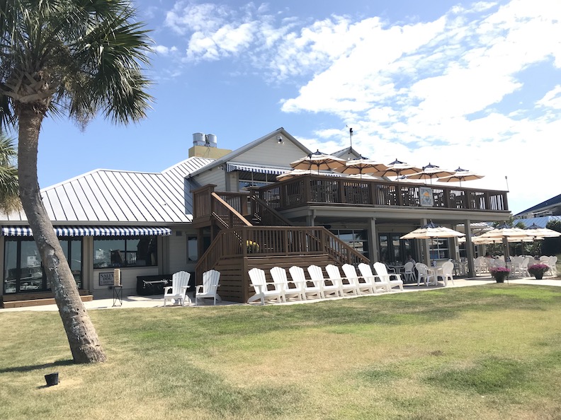 Wide shot of the exterior of The Salty Dog Cafe Bohiucket Marina