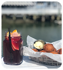 Mason jar drink and hushpuppies.