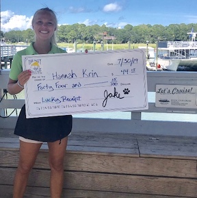 Woman holding a big check